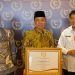 Bupati Rohil Terima Penghargaan Kepala Daerah Peduli Kerukunan Antar Suku dan Umat Beragama