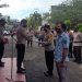 Polsek Tanah Putih Motori Perbaikan Jalan Rusak di KM21 Menggala Sempurna