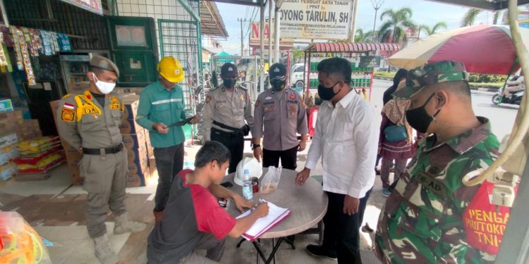 Polsek Pangkalan Kerinci Terapkan Protokol Kesehatan Melalui Operasi Yustisi