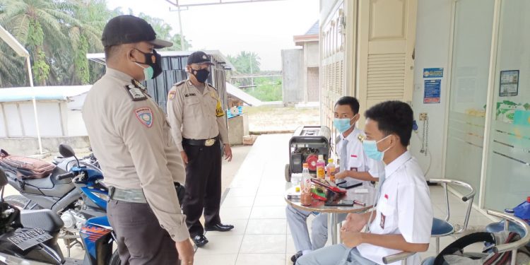 Kapolsek Kerumutan Kerahkan Personil Lakukan Operasi Yustisi