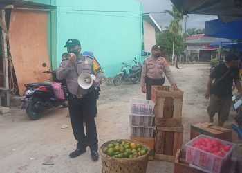 Polsek Pangkalan Kuras Cek Penerapan Prokes di Pasar Desa Terantang Manuk
