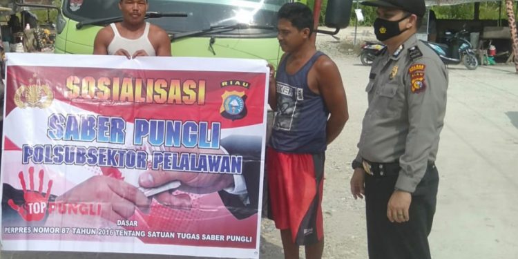 Berantas Pungli, Polsubsektor Pelalawan Tingkatkan Sosialisasi Saber Pungli
