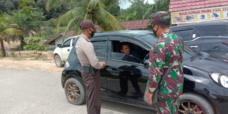 Berikan Rasa Aman, Polsek Langgam Rutin Patroli dan Imbau Disiplin Prokes