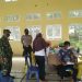 Polsek Ukui Bersama TNI dan Puskesmas Ukui Gelar Vaksinasi Dosis I