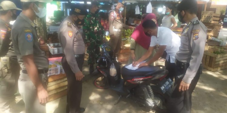 Polsek Pangkalan Kerinci Optimalkan Operasi Yustisi di Wilkum