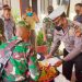 Dalam HUT Bhayangkara, Koramil 04 Tualang Memberikan Tumpeng Kepada Polsek Tualang