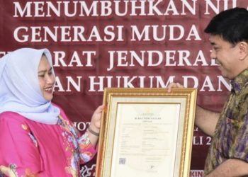 Bupati Bengkalis Terima Sertifikat Pencatatan Ciptaan Booklet Bengkalis Bermasa