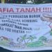 Spanduk Dugaan Konflik Lahan Tangkap Mafia Tanah Beredar di Pekanbaru