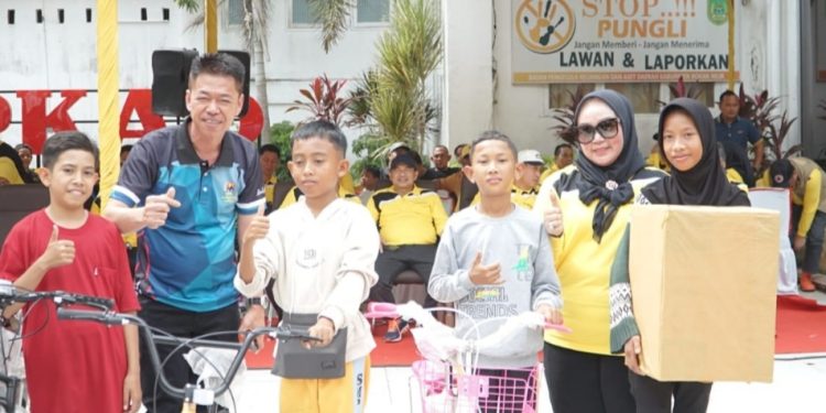 Ratusan Masyarakat Ramaikan Jalan Santai HUT Rohil ke 24 dan Bulan Inklusi Keuangan